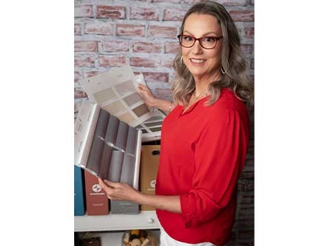 Professional woman with Hunter Douglas samples